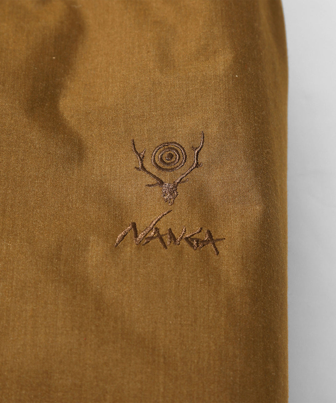 South2 West8 x NANGA Tenkara ダウンジャケット